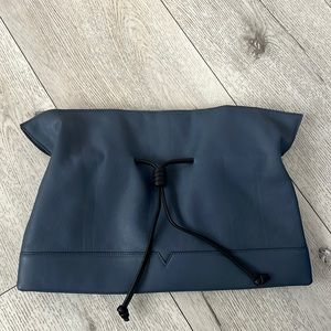 The clutch navy blue with black